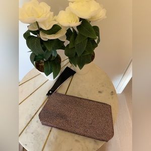 Purple sparkly cosmetic bag